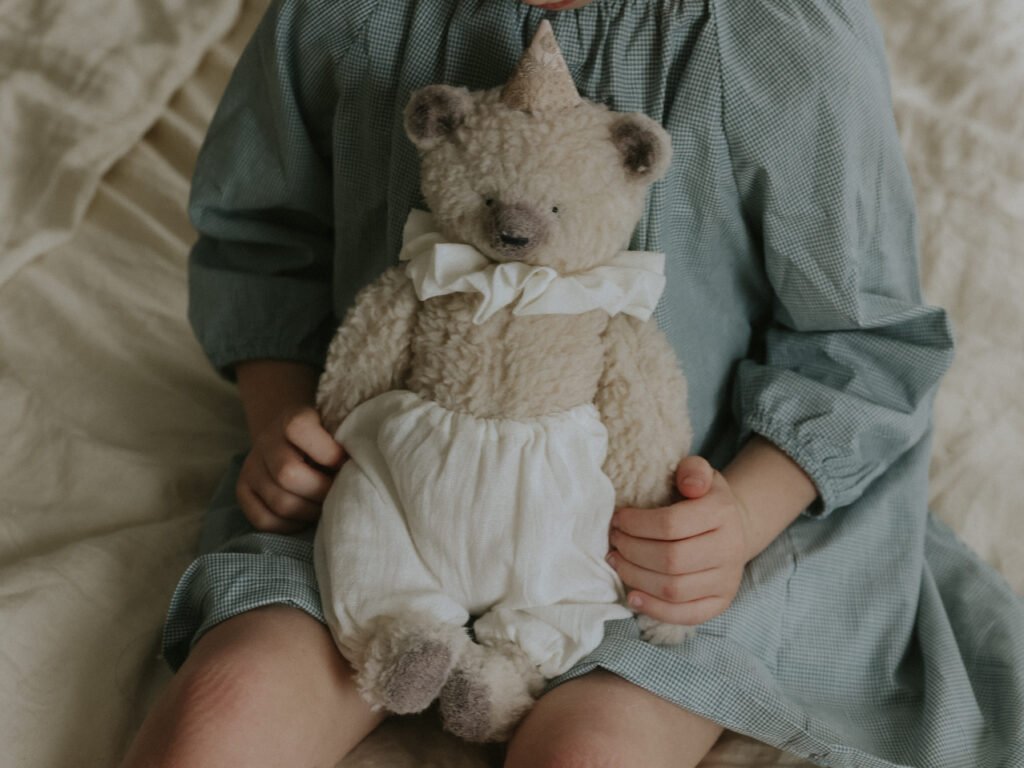 Handmade fabric polar bear doll Agnes by Prim Dolls, photography prop for kids.
